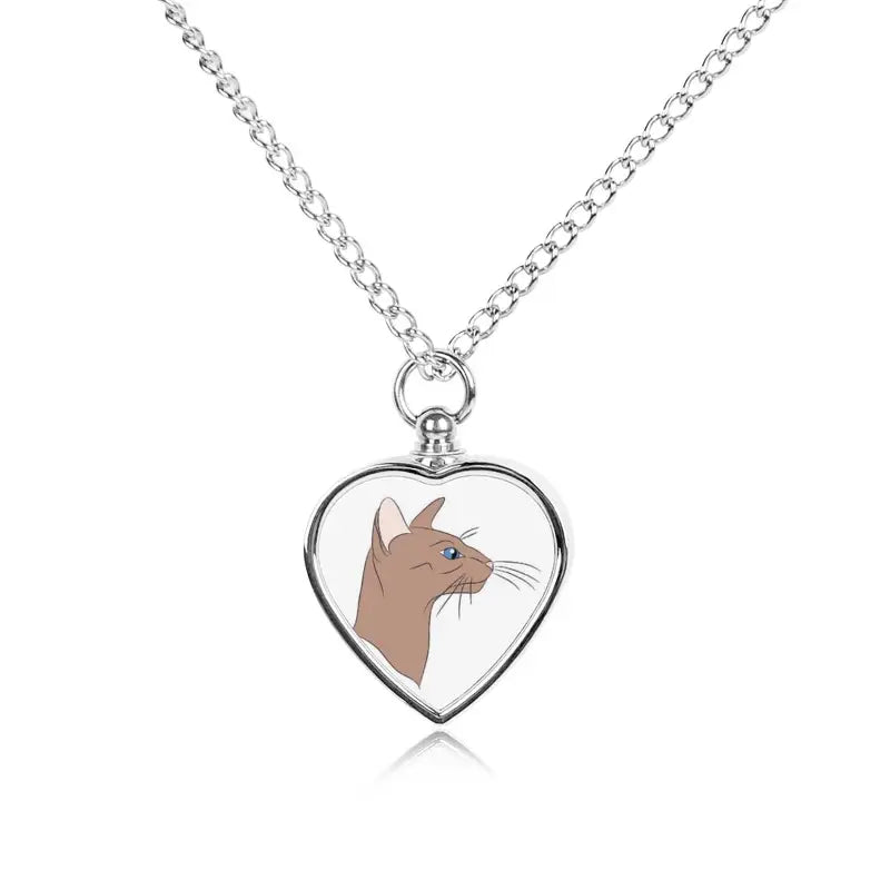 Pendentif personnalisé avec tête de chat dans un médaillon en forme de cœur, parfait pour garder un souvenir tangible